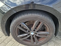 Personenauto bmw, 1 serie 116i, zwart, bouwjaar 2009 - afbeelding 27 van  134