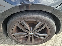 Personenauto bmw, 1 serie 116i, zwart, bouwjaar 2009 - afbeelding 28 van  134