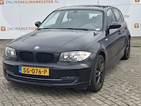 Personenauto bmw, 1 serie 116i, zwart, bouwjaar 2009 - afbeelding 1 van  134