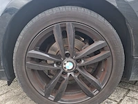 Personenauto bmw, 1 serie 116i, zwart, bouwjaar 2009 - afbeelding 66 van  134