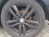 Personenauto bmw, 1 serie 116i, zwart, bouwjaar 2009 - afbeelding 134 van  134