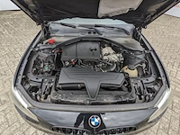 Personenauto bmw, 1-serie 116i, zwart, bouwjaar 2012 - afbeelding 40 van  62