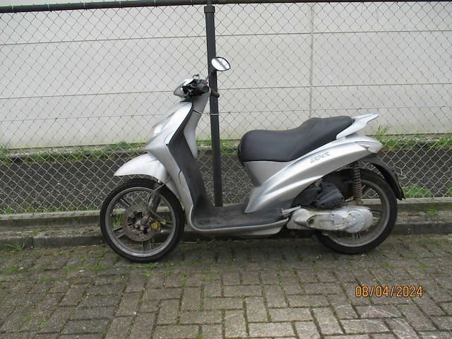 Peugeot - bromscooter - looxor 2 tact - scooter - afbeelding 1 van  10