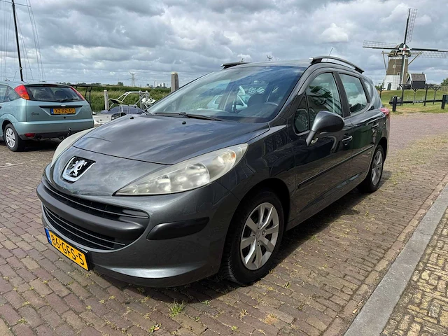 Peugeot 207 sw 1.4 vti pano x-line 86-gfs-5 - afbeelding 1 van  24