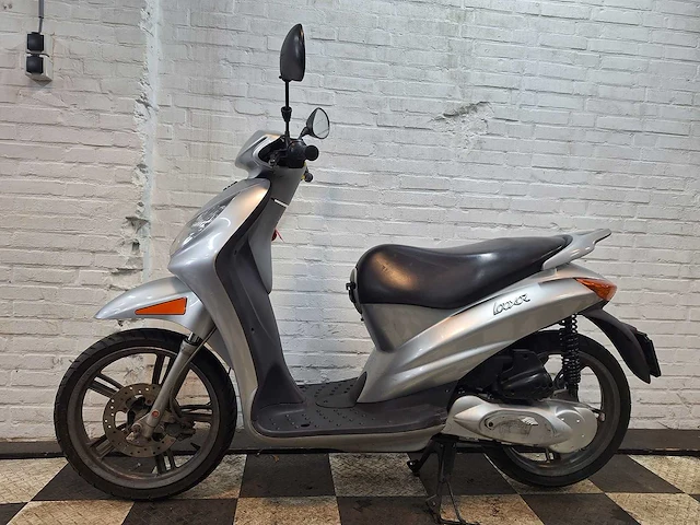 Peugeot looxor 25 km snorscooter 2takt - afbeelding 1 van  7