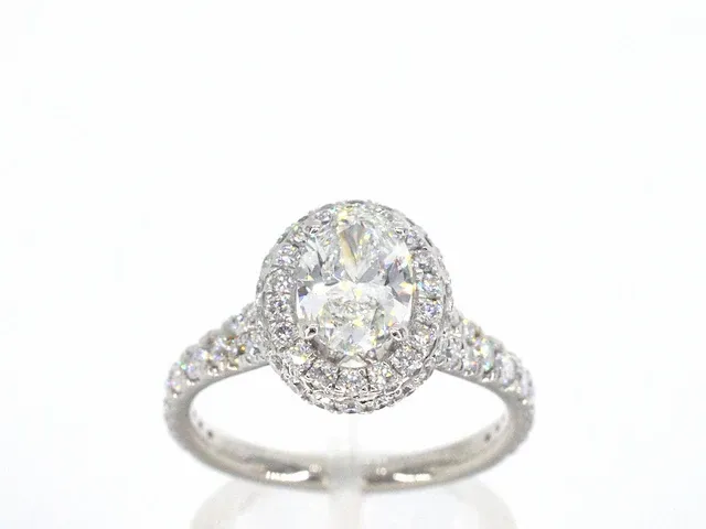 Platina entourage ring met 1.00 carat ovaal geslepen diamant en briljant diamanten - afbeelding 1 van  10