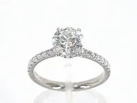 Platina solitair ring met een 1.51 carat gecertificeerde briljant diamant en een hidden helo