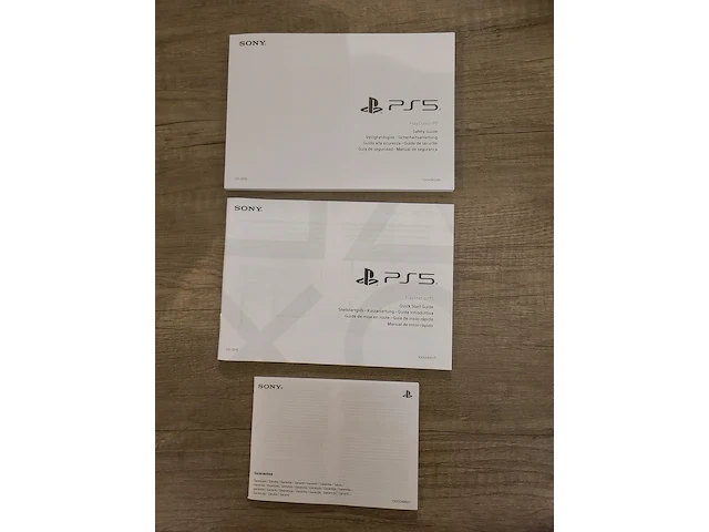 Playstation 5 disc edition console (in nieuwstaat) + gta 5 game + draadloze controller + kabels & handleiding - afbeelding 3 van  12