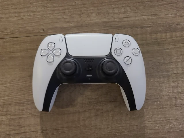 Playstation 5 disc edition console (in nieuwstaat) + gta 5 game + draadloze controller + kabels & handleiding - afbeelding 8 van  12