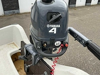 Polyesterboot met buitenboordmotor en trailer - afbeelding 11 van  23