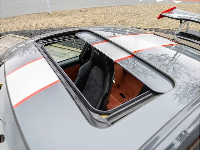Porsche 911 997 3.6 direct fuel 380pk automaat 2012 rsr omgebouwd schuifdak 360°camera bose dab - afbeelding 4 van  45