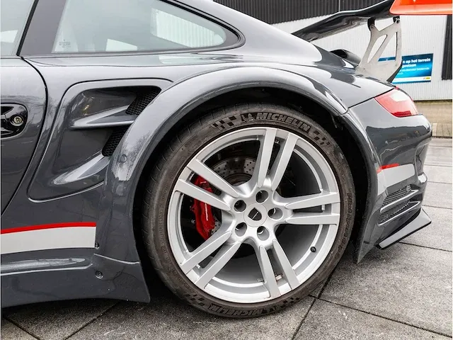Porsche 911 997 3.6 direct fuel 380pk automaat 2012 rsr omgebouwd schuifdak 360°camera bose dab - afbeelding 27 van  45