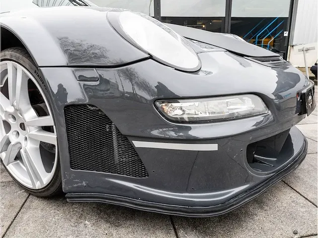 Porsche 911 997 3.6 direct fuel 380pk automaat 2012 rsr omgebouwd schuifdak 360°camera bose dab - afbeelding 28 van  45