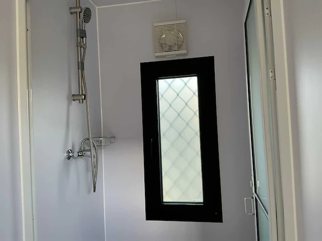 Portable home met 2 woonruimtes / 40 ft high cube - 12 meter containerwoning - afbeelding 8 van  28