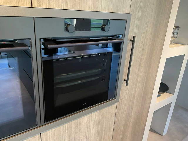 Puur beda firenze-fantasia eiland showroomkeuken met hoge kastenwand - afbeelding 25 van  34