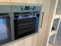 Puur beda firenze-fantasia eiland showroomkeuken met hoge kastenwand - afbeelding 25 van  34