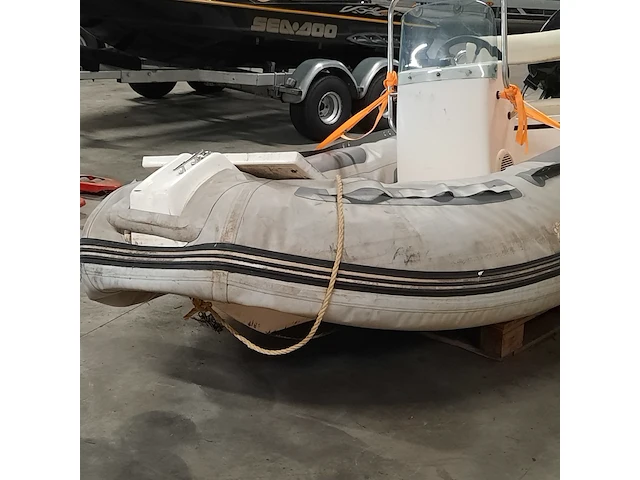 Rib rubberboot met suzuki 9,9 pk buitenboordmotor excellent - afbeelding 28 van  32