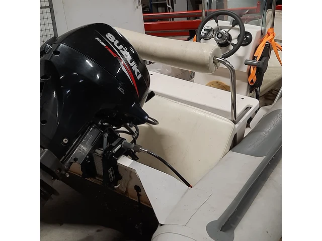 Rib rubberboot met suzuki 9,9 pk buitenboordmotor excellent - afbeelding 32 van  32