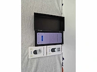 Samsung galaxy z flip4, 128gb opslag grafiet | samsung galaxy smarttag 2 zwart - afbeelding 2 van  3
