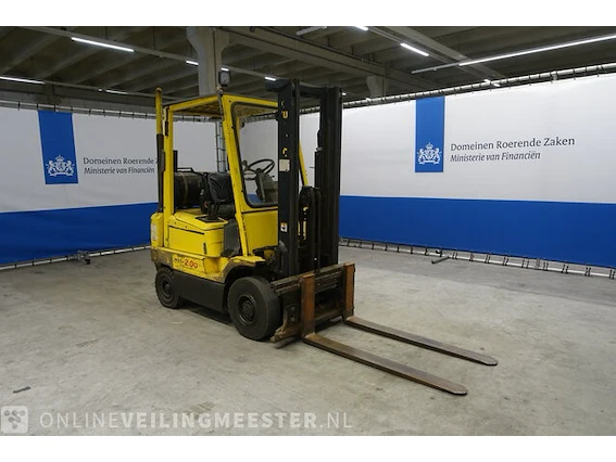 Schaarhoogwerker genie en heftruck hyster