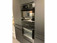 Schuller c fma fino matt-c avo avola eiland showroomkeuken met hoekwandopstelling en hoge kastenwand - afbeelding 48 van  59