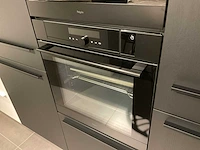 Schuller c fma fino matt-c avo avola eiland showroomkeuken met hoekwandopstelling en hoge kastenwand - afbeelding 49 van  59