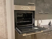Showroom nobilia laser decor zwart beton hoek keuken - afbeelding 17 van  20