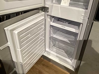 Showroom nobilia riva decor beton grijs eiland keuken - afbeelding 16 van  28