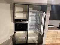 Showroom nobilia riva terra beton grijs eilandkeuken - afbeelding 5 van  23