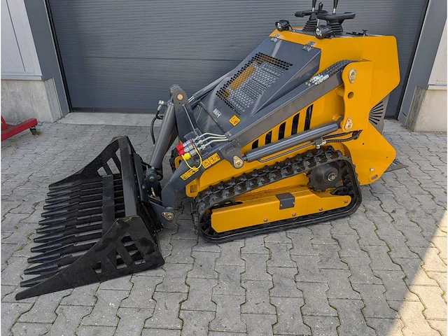 Skidster - 25pk - 2 cilinder - puinbak en grondbak - shovel - afbeelding 1 van  9