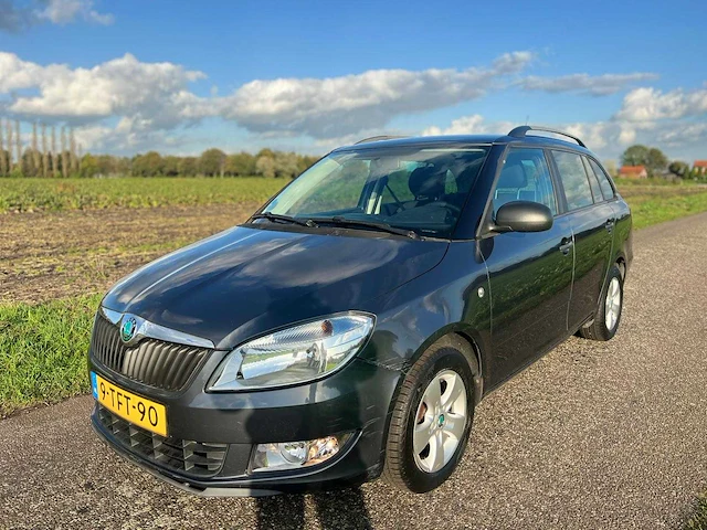 Skoda - fabia combi - 1.2 tsi scout - 9-tft-90 - 2012 - afbeelding 1 van  11