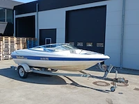 Speedboot met stallingstrailer, wellcraft, excel, wit/blauw