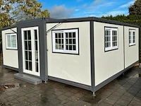 Stahlworks mobile tiny house met twee slaapkamers en een keuken deluxe (19x20ft) - afbeelding 1 van  16