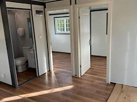 Stahlworks mobile tiny house met twee slaapkamers en een keuken deluxe (19x20ft) - afbeelding 9 van  16