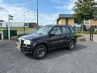 Suzuki - 2001 - grand vitara - 2.5 v6 4x4 - personenauto - afbeelding 1 van  15