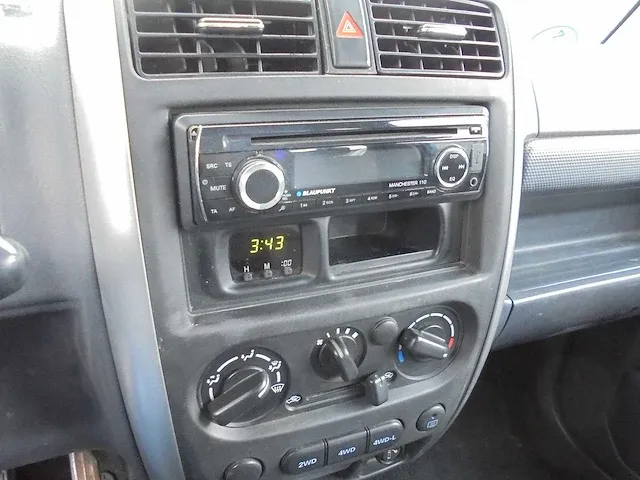 Suzuki - jimny - 1.3 jx - x-443-zr - 2006 - afbeelding 11 van  11