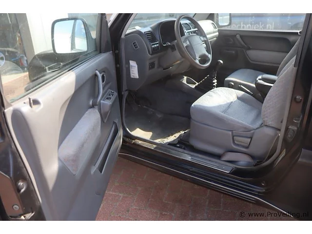 Suzuki jimny cabrio - 1.3 benzine | apk tot september 2026 | kenteken 19-pb-vb - afbeelding 4 van  25