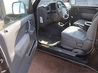 Suzuki jimny cabrio - 1.3 benzine | apk tot september 2026 | kenteken 19-pb-vb - afbeelding 4 van  25
