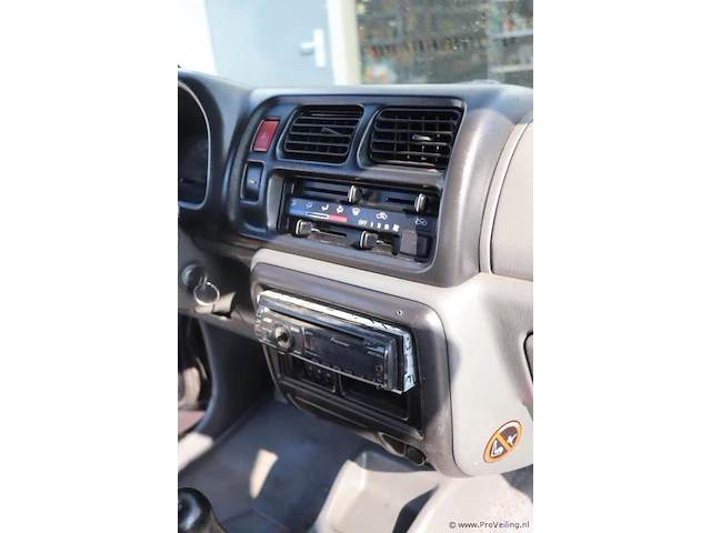 Suzuki jimny cabrio - 1.3 benzine | apk tot september 2026 | kenteken 19-pb-vb - afbeelding 9 van  25