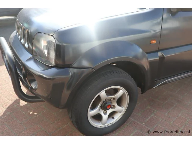 Suzuki jimny cabrio - 1.3 benzine | apk tot september 2026 | kenteken 19-pb-vb - afbeelding 19 van  25