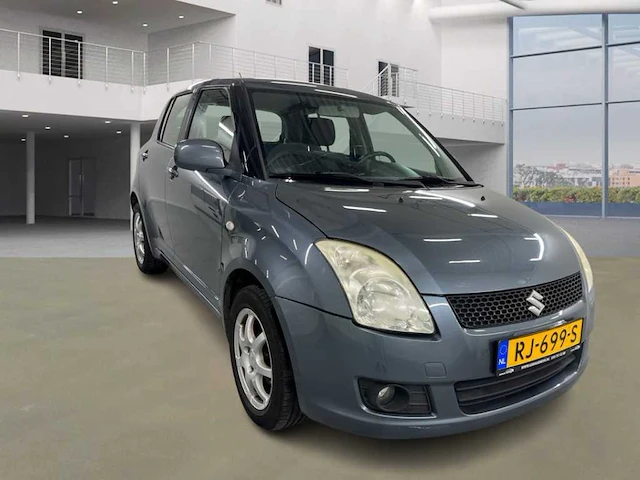 Suzuki swift 1.3 4grip exclusive, rj-699-s - afbeelding 10 van  16