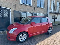 Suzuki swift 1.3 airco shogun 5-deurs 47-tt-gb - afbeelding 14 van  17