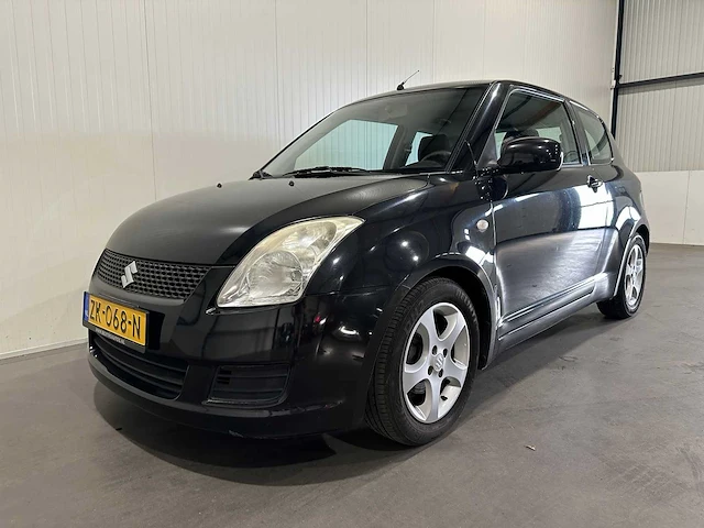Suzuki swift 1.3 comfort zk-068-n - afbeelding 1 van  17