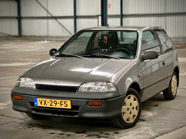 Suzuki swift 1.3 commercial de luxe grijs kenteken vx-29-fs - afbeelding 1 van  12