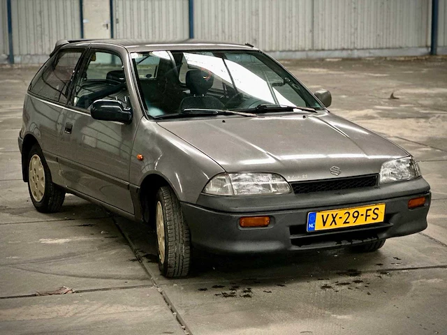 Suzuki swift 1.3 commercial de luxe grijs kenteken vx-29-fs - afbeelding 6 van  12