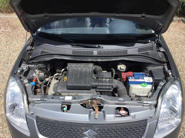 Suzuki swift personenauto - afbeelding 12 van  14