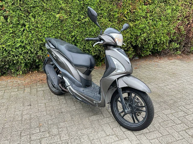Sym bromscooter dkn-41-d - afbeelding 1 van  13