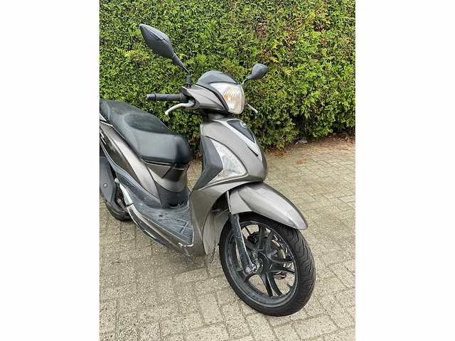 Sym bromscooter dkn-41-d - afbeelding 9 van  13