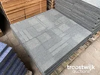 Tapijttegel (50m2)