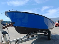 Toer boot met buitenboordmotor en trailer - afbeelding 2 van  36
